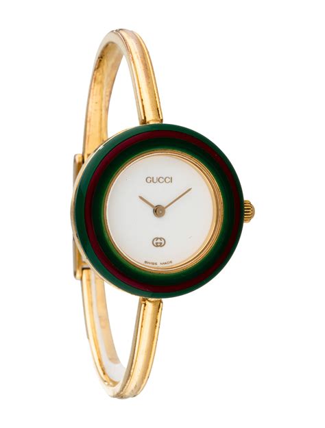 gucci watch with colored bezels.